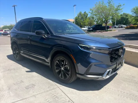 Photos of 2023 Honda CR-V Hybrid Sport Touring for sale in Albuquerque, NM at Truck Solutions NM