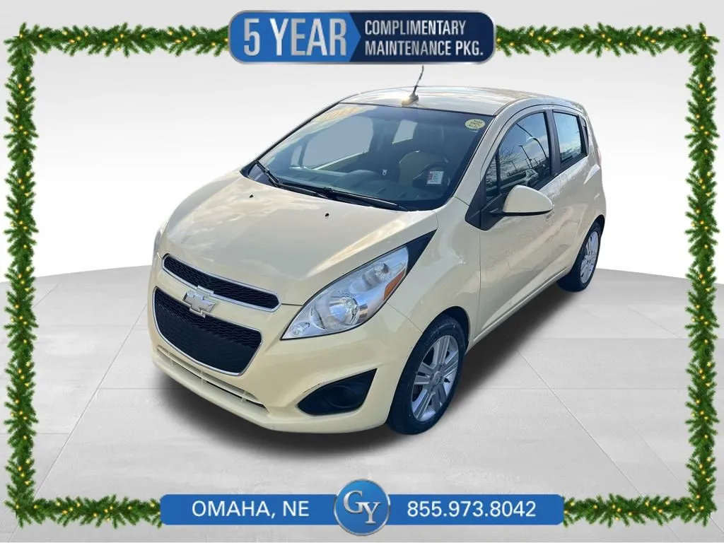 Yellow 2014 Chevrolet Spark 1LT for sale in Omaha, NE