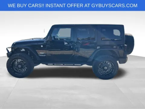 Another view of 2014 Jeep Wrangler Unlimited Sahara for sale in Omaha, NE at Gregg Young Chevrolet - Omaha