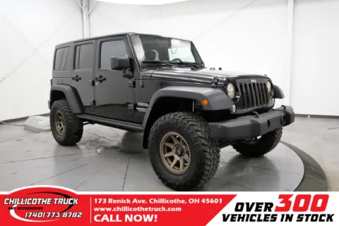 Black 2014 Jeep Wrangler Unlimited Sport for sale in Chillicothe, OH