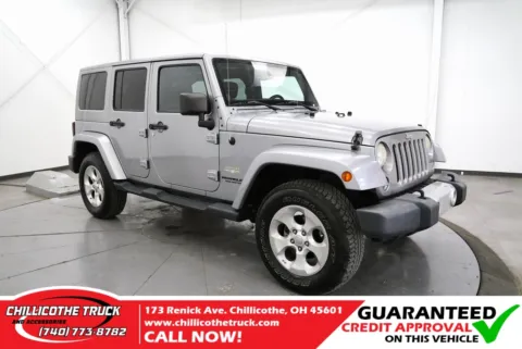 Silver 2014 Jeep Wrangler Unlimited Sahara for sale in Chillicothe, OH