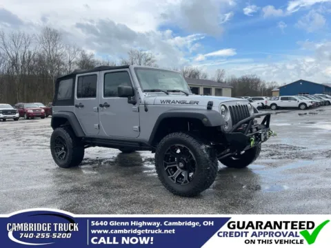 Silver 2015 Jeep Wrangler Unlimited Sport for sale in Cambridge, OH