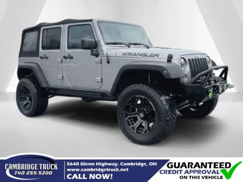 Silver 2015 Jeep Wrangler Unlimited Sport for sale in Cambridge, OH