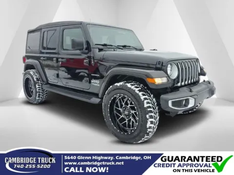 Black 2021 Jeep Wrangler Unlimited Sahara for sale in Cambridge, OH