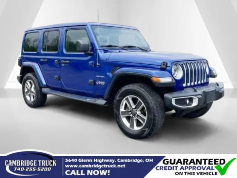 Blue 2019 Jeep Wrangler Unlimited Sahara for sale in Cambridge, OH