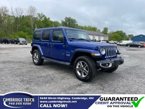 Blue 2019 Jeep Wrangler Unlimited Sahara for sale in Cambridge, OH