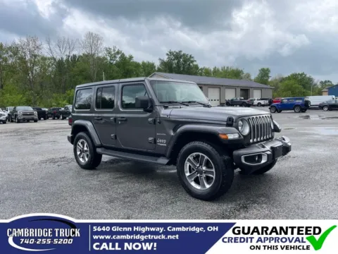 Gray 2022 Jeep Wrangler Unlimited Sahara for sale in Cambridge, OH