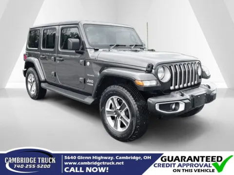Gray 2022 Jeep Wrangler Unlimited Sahara for sale in Cambridge, OH
