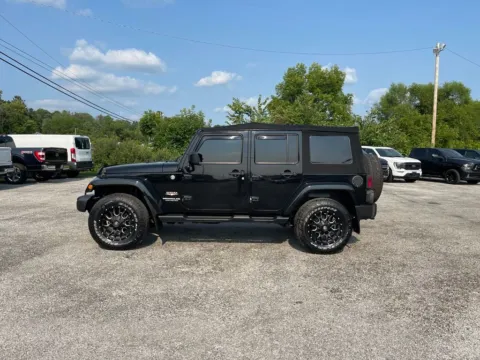 More photos of 2015 Jeep Wrangler Unlimited Sahara at Cambridge Truck, OH