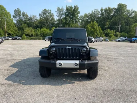 Photos of 2015 Jeep Wrangler Unlimited Sahara for sale in Cambridge, OH at Cambridge Truck