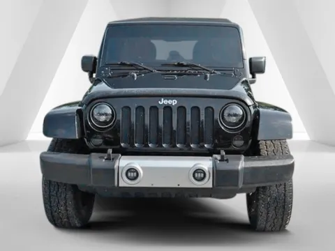 Photos of 2015 Jeep Wrangler Unlimited Sahara for sale in Cambridge, OH at Cambridge Truck