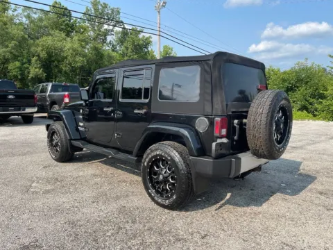 More photos of 2015 Jeep Wrangler Unlimited Sahara at Cambridge Truck, OH