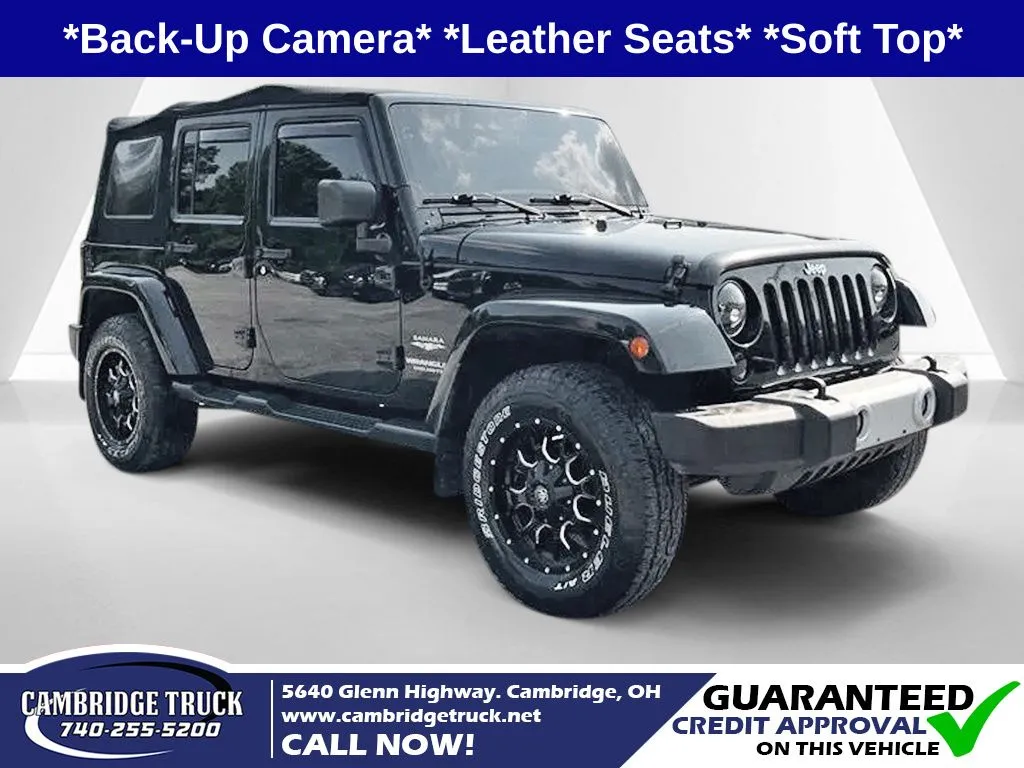 Black 2015 Jeep Wrangler Unlimited Sahara for sale in Cambridge, OH