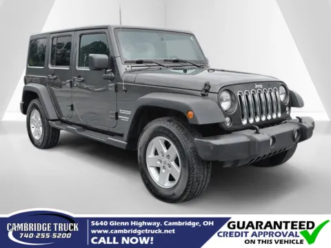 Gray 2017 Jeep Wrangler Unlimited Sport for sale in Cambridge, OH