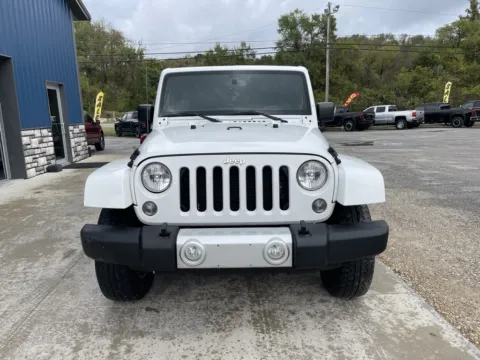 Photos of 2014 Jeep Wrangler Sahara for sale in Cambridge, OH at Cambridge Truck