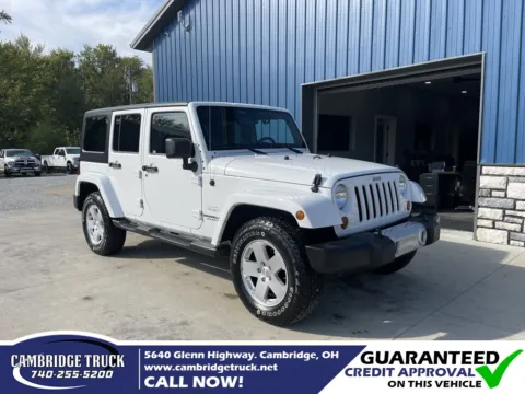 White 2012 Jeep Wrangler Unlimited Sahara for sale in Cambridge, OH