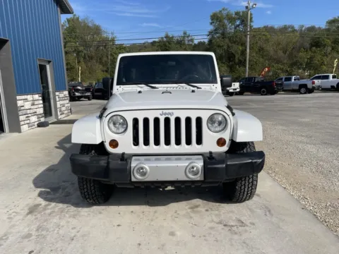 Photos of 2012 Jeep Wrangler Unlimited Sahara for sale in Cambridge, OH at Cambridge Truck
