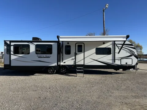 Photos of 2021 Heartland North Trail 33RETS for sale in Valley View, TX at Liberty Trail RV - Denton