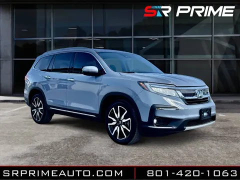 More photos of 2022 Honda Pilot Touring w/Rear Captain's Chairs at SR PRIME AUTO, UT