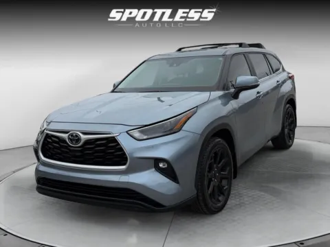 Blue 2023 Toyota Highlander LE for sale in San Antonio, TX