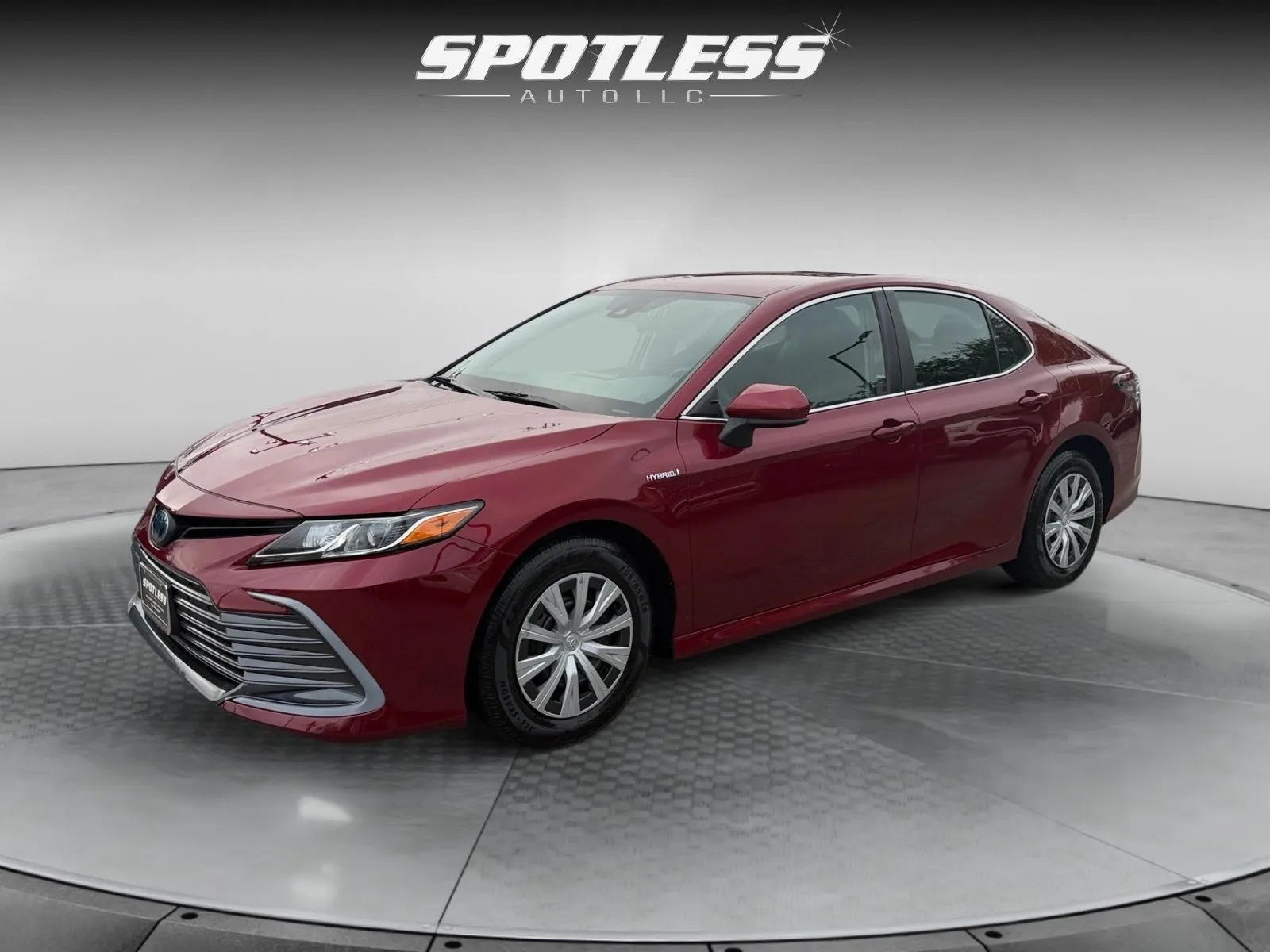 Red 2021 Toyota Camry Hybrid LE for sale in San Antonio, TX