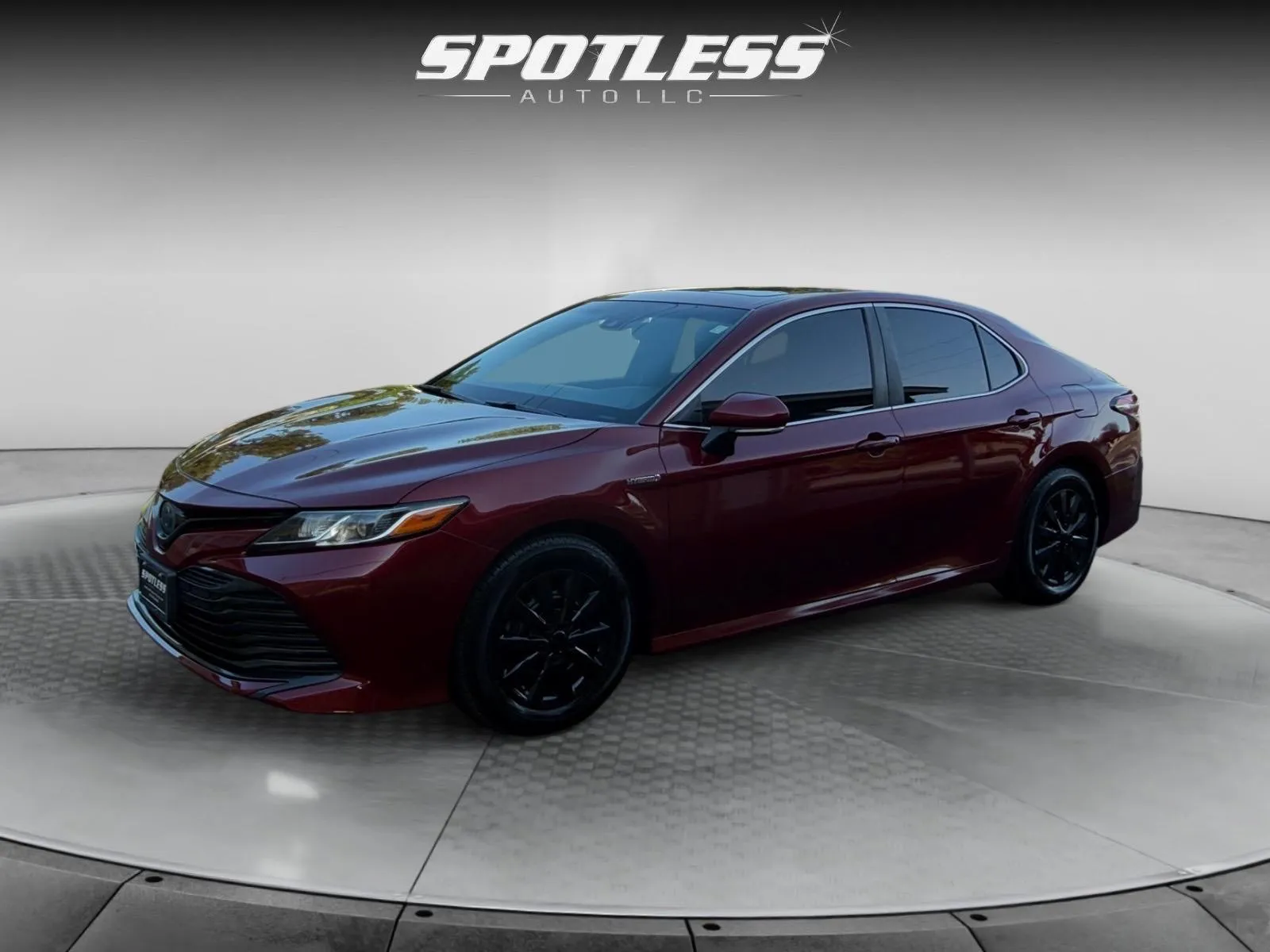 Red 2018 Toyota Camry Hybrid LE for sale in San Antonio, TX