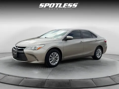 Beige 2016 Toyota Camry Hybrid LE for sale in San Antonio, TX