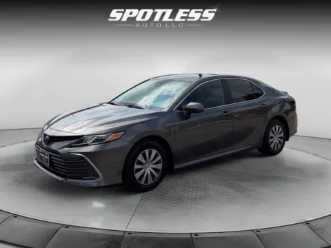 Gray 2023 Toyota Camry Hybrid LE for sale in San Antonio, TX