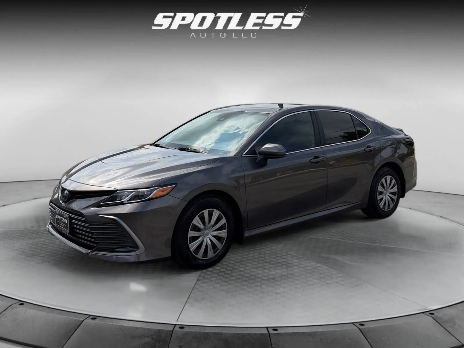 Gray 2023 Toyota Camry Hybrid LE for sale in San Antonio, TX
