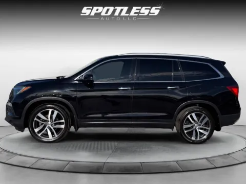 More photos of 2018 Honda Pilot Touring at Spotless Auto Loop 1604, TX