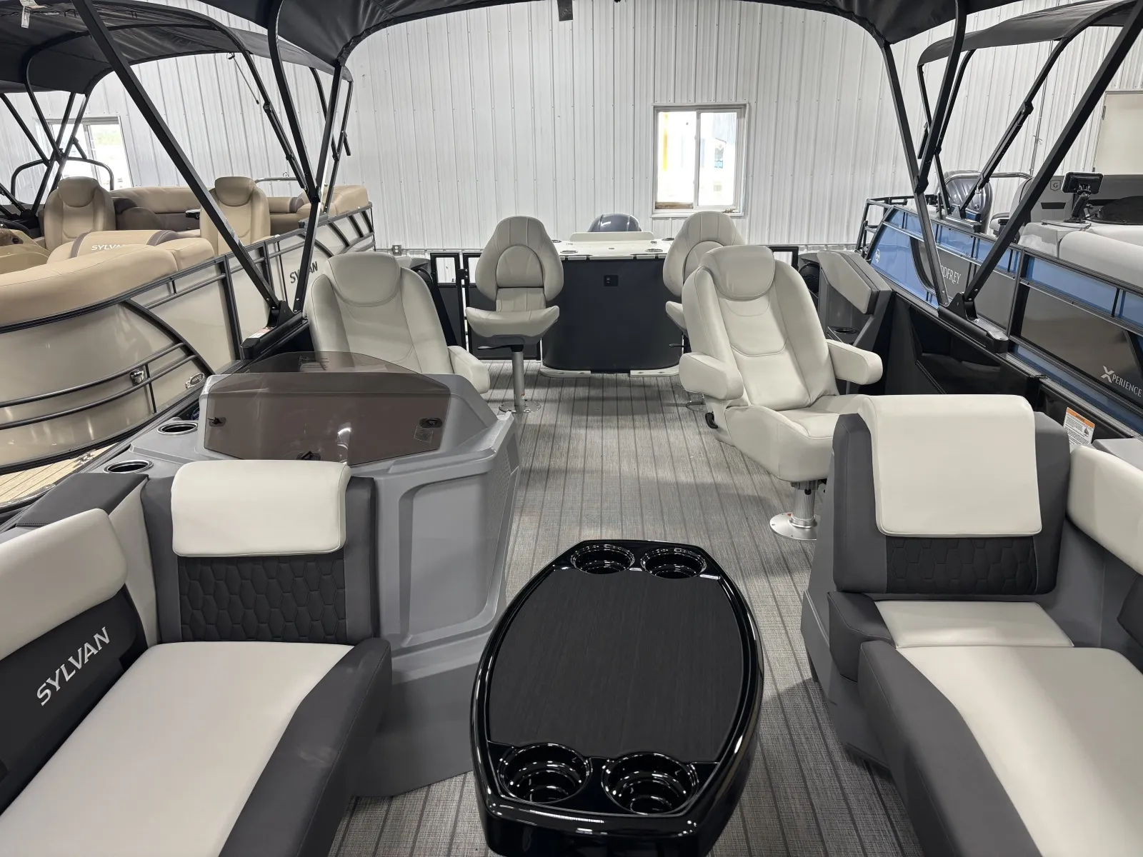Photos of 2026 SYLVAN R SERIES R-22 PARTY FISH 115HP BUNK TRAILER for sale in Detroit Lakes, MN at McLaughlin's RV & Marine - Detroit Lakes
