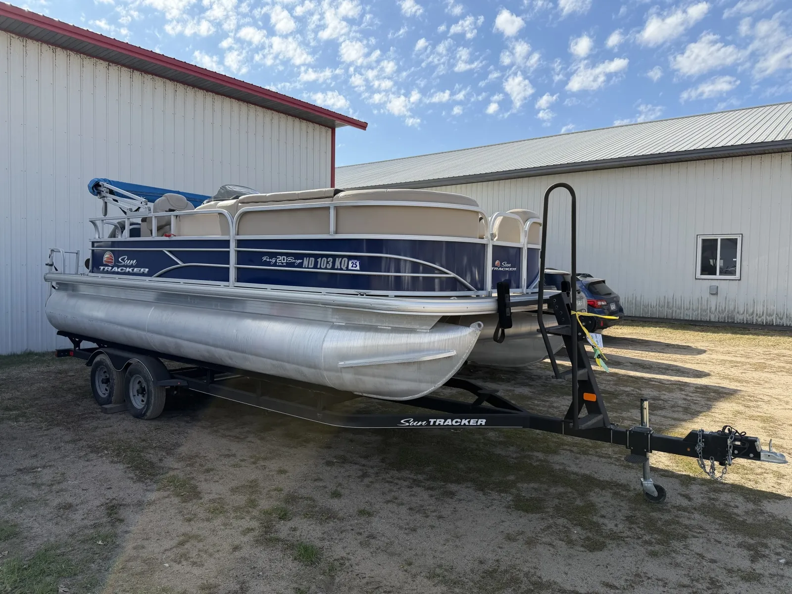 Photos of 2018 SUNTRACKER PARTY BARGE 20 DLX 90HP BUNK TRAILER for sale in Detroit Lakes, MN at McLaughlin's RV & Marine - Detroit Lakes