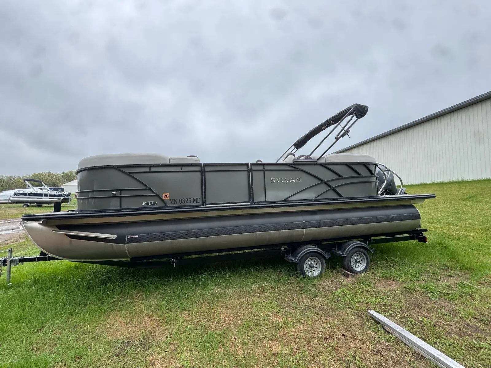 Photos of 2021 SYLVAN L-SERIES L-3 LZ DH 150HP LEGS BUNK TRAILER for sale in Detroit Lakes, MN at McLaughlin's RV & Marine - Detroit Lakes
