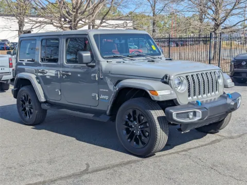 Photos of 2022 Jeep Wrangler Unlimited Sahara 4xe for sale in Kennesaw, GA at Town Center Nissan