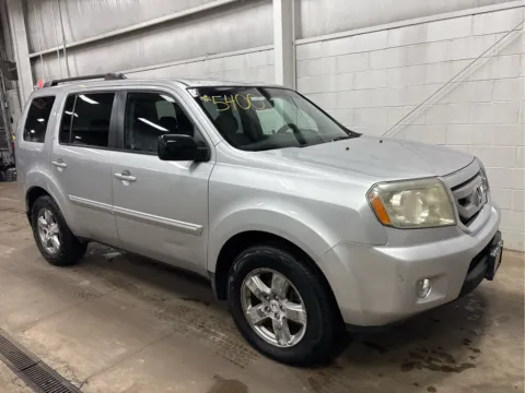 Photos of 2011 Honda Pilot EX-L for sale in Wilmington, OH at Wilmington Auto Center Chrysler Dodge Jeep RAM