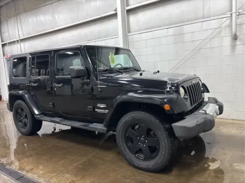 Photos of 2010 Jeep Wrangler Unlimited Sahara for sale in Wilmington, OH at Wilmington Auto Center Chrysler Dodge Jeep RAM