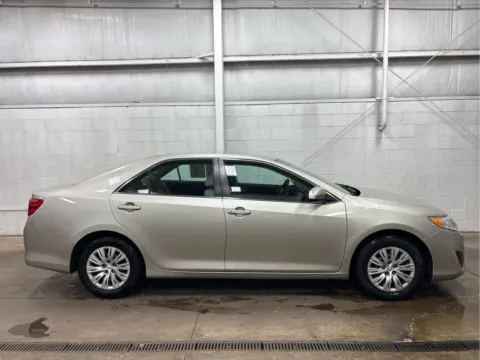 Photos of 2014 Toyota Camry L for sale in Wilmington, OH at Wilmington Auto Center Chrysler Dodge Jeep RAM