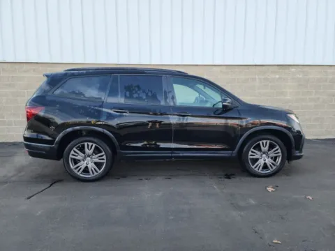 Photos of 2022 Honda Pilot Sport for sale in Wilmington, OH at Wilmington Auto Center Chrysler Dodge Jeep RAM