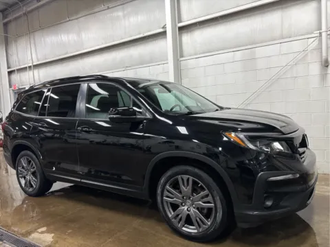Photos of 2022 Honda Pilot Sport for sale in Wilmington, OH at Wilmington Auto Center Chrysler Dodge Jeep RAM