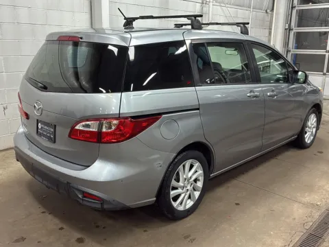 Photos of 2012 Mazda Mazda5 Sport for sale in Wilmington, OH at Wilmington Auto Center Chrysler Dodge Jeep RAM