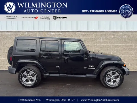 Black 2016 Jeep Wrangler Unlimited Sahara for sale in Wilmington, OH