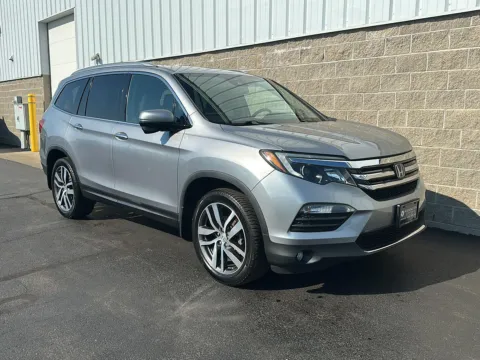 Photos of 2016 Honda Pilot Touring for sale in Wilmington, OH at Wilmington Auto Center Chrysler Dodge Jeep RAM