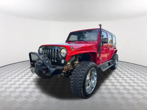 Red 2017 Jeep Wrangler Unlimited Sport for sale in Newnan, GA