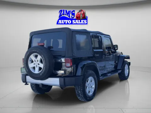 Another view of 2015 Jeep Wrangler Unlimited Sahara for sale in Logansport, IN at Zim's Auto Sales