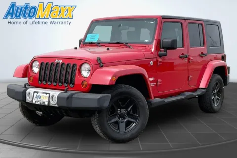 Red 2010 Jeep Wrangler Unlimited Sahara for sale in Aberdeen, SD