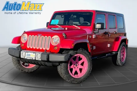 Red 2010 Jeep Wrangler Unlimited Sahara for sale in Lemmon, SD
