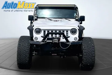Another view of 2014 Jeep Wrangler Unlimited Sport for sale in Lemmon, SD at AutoMaxx of Lemmon
