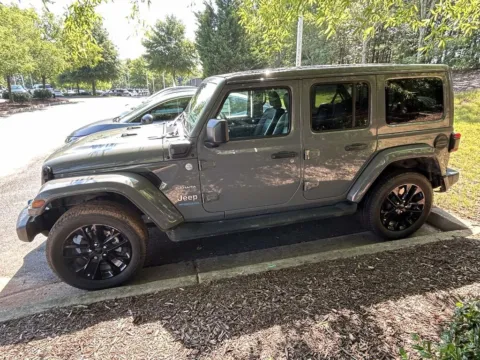 Photos of 2022 Jeep Wrangler Unlimited Sahara 4xe for sale in Cumming, GA at Nissan Of Cumming