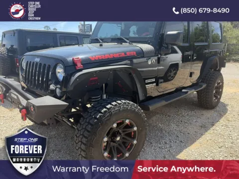 Black 2016 Jeep Wrangler Unlimited Sport for sale in Crestview, FL