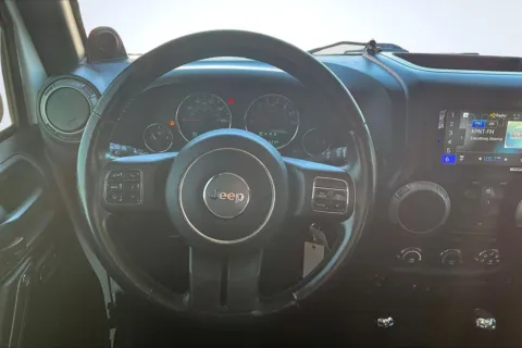 More photos of 2014 Jeep Wrangler Unlimited Sport at South County Auto Plaza, MO